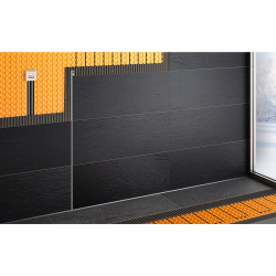 schlüter ditra heat-e entkopplungsmatte mit heizkabel thermostatbox und schwarzen wand- und bodenfliesen