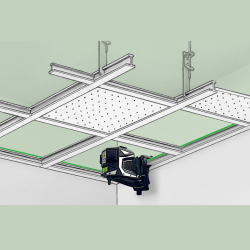 grüner kreuzlinienlaser montiert an abgehängter deckenrasterkonstruktion aus stahlprofilen